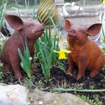Pair of good quality cast iron pigs
