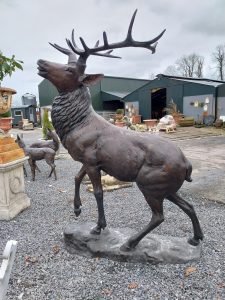 Exceptional quality lifesize bronze model of Stag on craggy rock