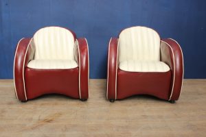 Pair of retro red and white ribbed leather tub chairs