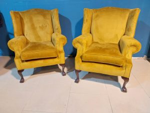 Pair of good quality 1950s crushed velvet wingback armchairs raised on mahogany cabriole legs